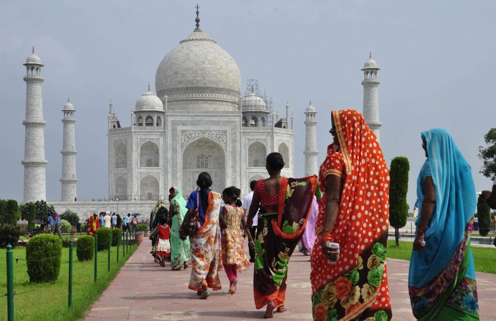 People visit the Taj Mahal in India